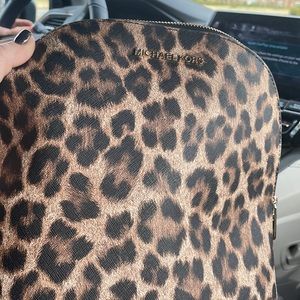 Michael Kors backpack.  Gently used with some wear on upper handles.  No rips.